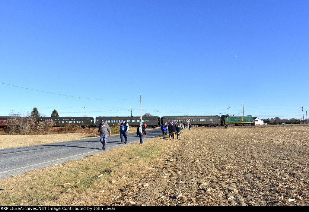 Participants with the diesel charter train in the background as it is stopped at Point Airy Road